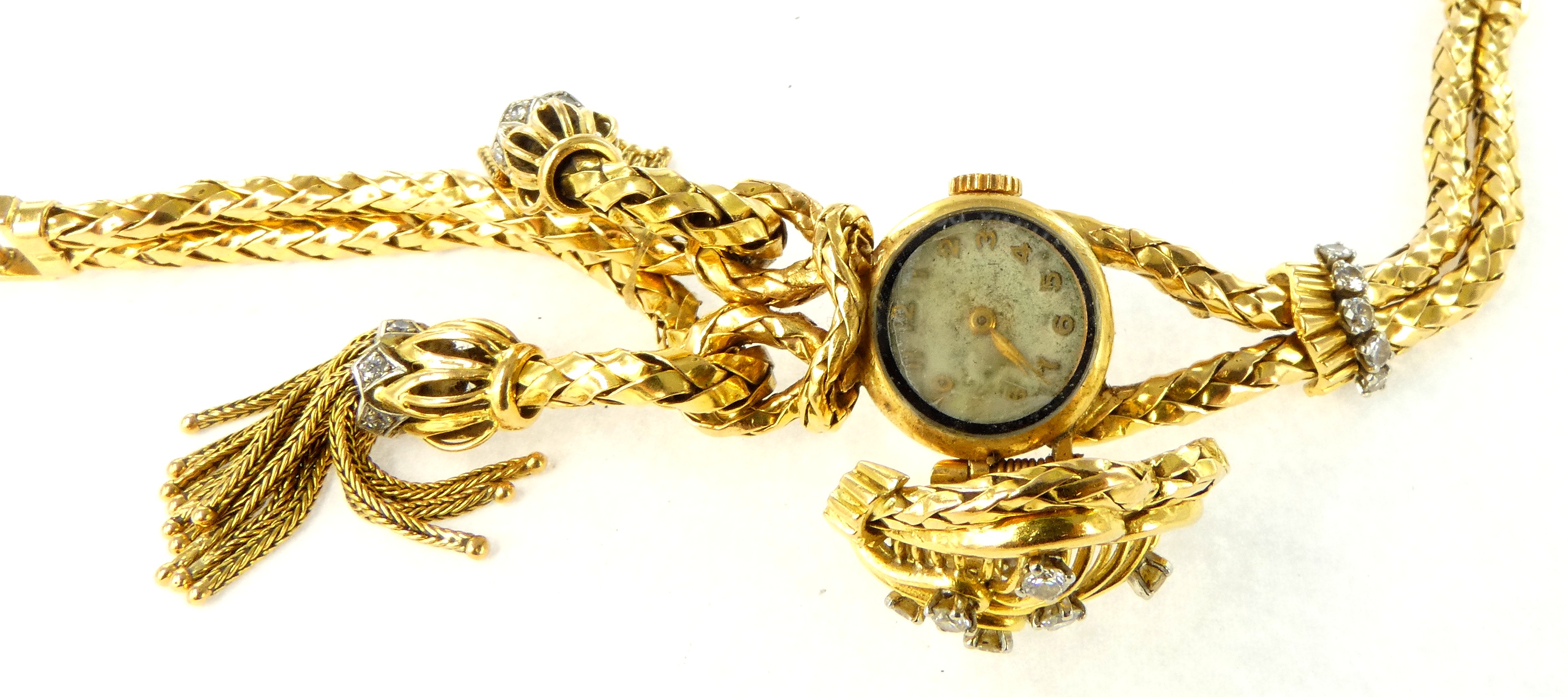Lot 2 — 1 Bracelet Montre Or 750 mil. Poinçonné, dégradé, serti de b